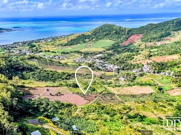 Expansive 12-Acre Agricultural Land in Quatre Soeurs with Stunning Views