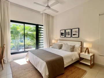 Elegant Lagoon-Level Apartment in Black River – Garden, Light & Privacy