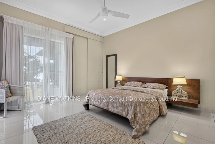 Beachfront Penthouse for Sale in Tamarin | 3 Bedrooms, Private Rooftop Terrace & Ocean Views