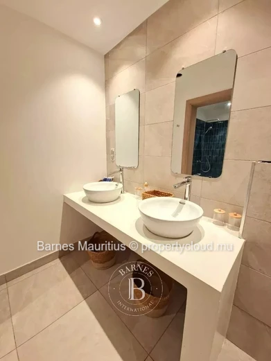 POINTE AUX CANONNIERS – Exceptional Beachfront Garden Apartment – 2 En-Suite Bedrooms