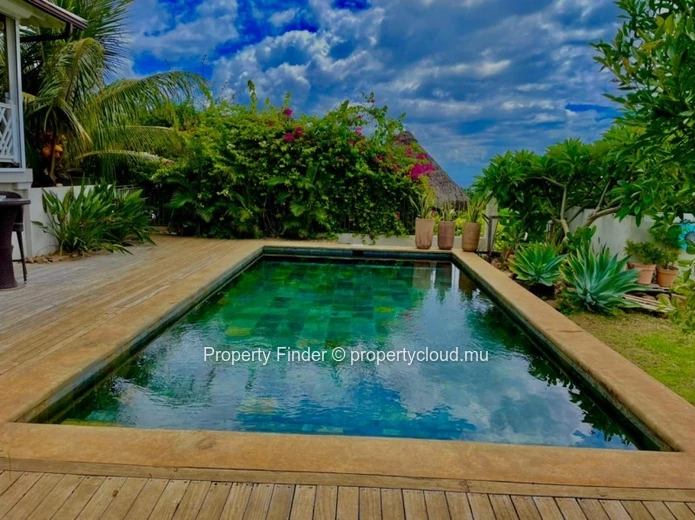 Luxury 5-Bedroom Villa  – Infinity Pool, Lagoon Views & Refined Island Living