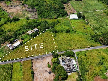 Golden Opportunity: Large Plot with Stunning Mountain and Sea Views, on the main road.