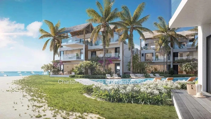 Appartement 1 chambre pieds dans l’eau avec jardin privatif face au lagon
