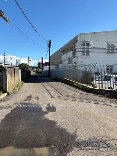 Prime 4,200m² Commercial Plot in Petit Camp — Mountain Views & Near Bus