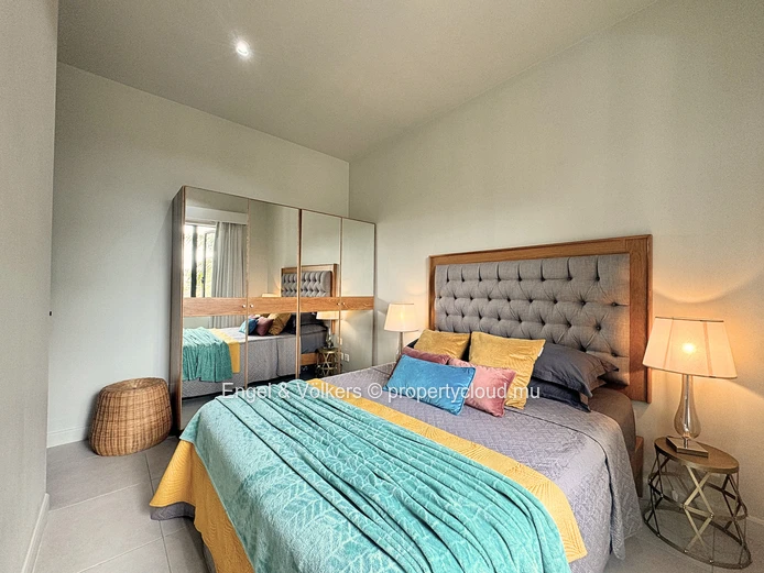 Exceptional Three-Bedroom Apartment with Panoramic Marina and Mountain Views