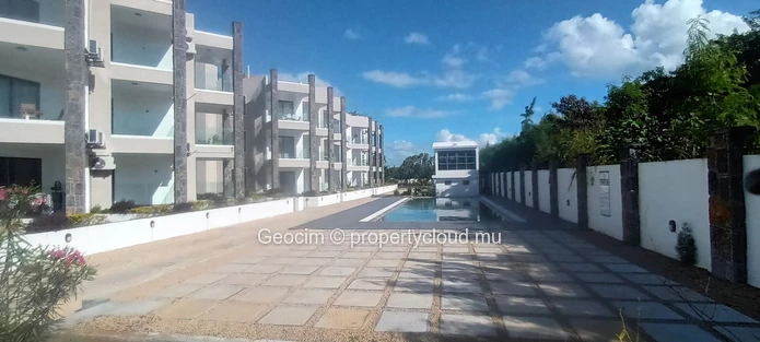 Roches Noires A 100 métres de la mer Appartement neuf de 2 càc balcon Parking Piscine communes. (Mandat exclusif)
