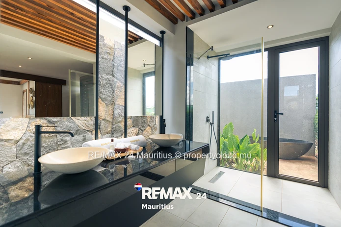 Elegant 4-bedroom Villa C with private pool, landscaped garden and spacious living areas.