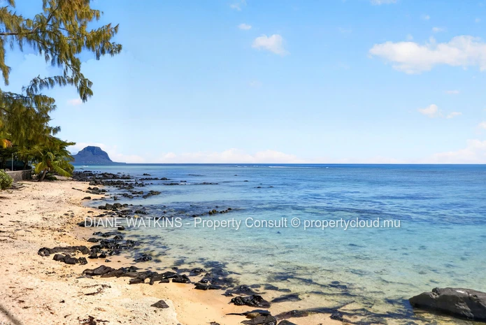 Beachfront Penthouse for Sale in Tamarin | 3 Bedrooms, Private Rooftop Terrace & Ocean Views