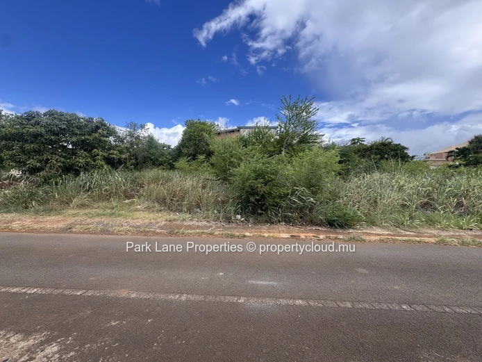 Land on corner in well established estate