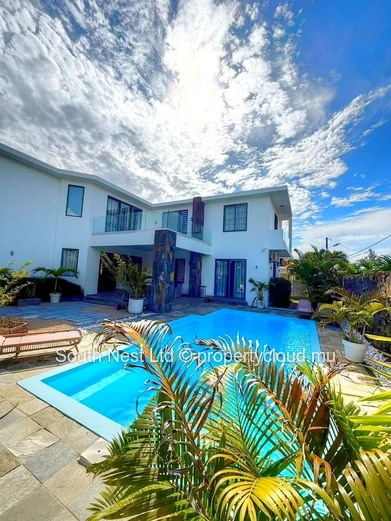 Une villa contemporaine d'exception alliant élégance raffinée, sophistication tropicale et intimité absolue dans l'un...