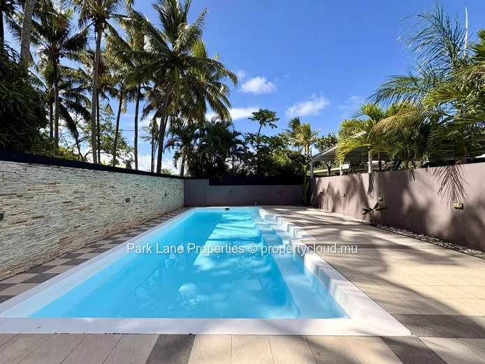 Appartement de 3 chambres avec accès mer à Blue Bay