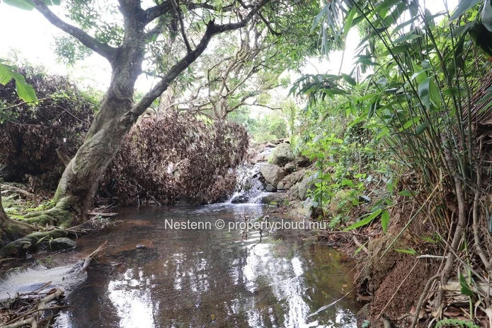 Residential land with mountain views with riverlet
