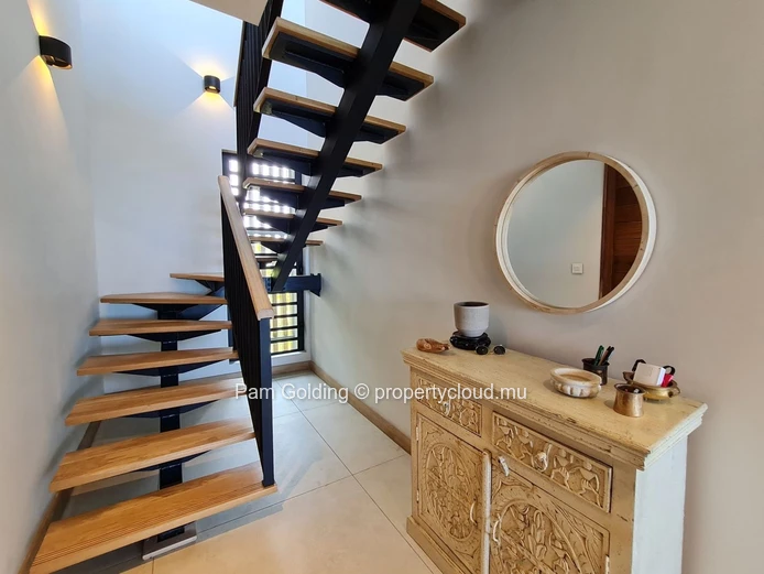 3-Bedroom Penthouse for Sale in Pointe aux Canonniers. Contemporary Design, Sea Views & Rooftop Pool