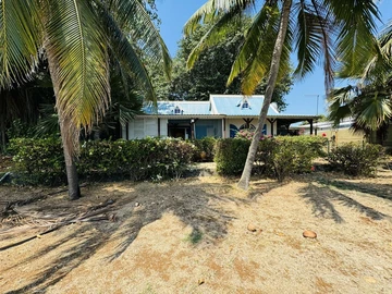 For Sale: Charming Beachfront Property in Pointe aux Sables