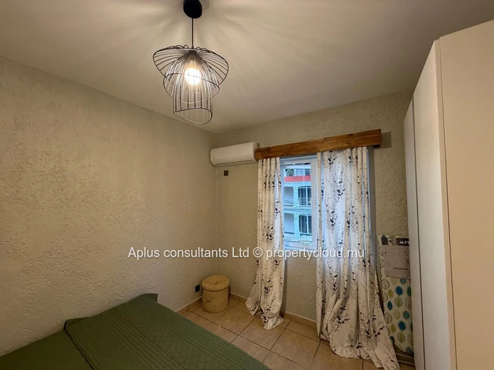 Stylish 2-Bed Apartment in Flic en Flac with Pool View
