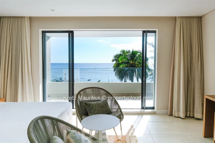 Duplex pieds dans l'eau avec vue panoramique sur le lagon