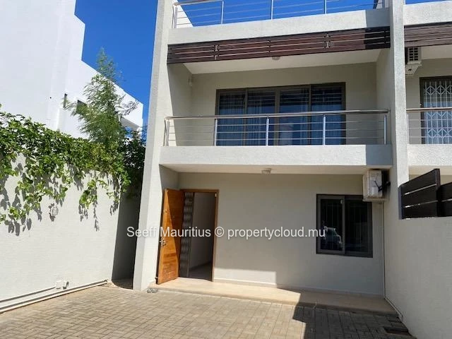 This splendid duplex features three bedrooms and three bathrooms