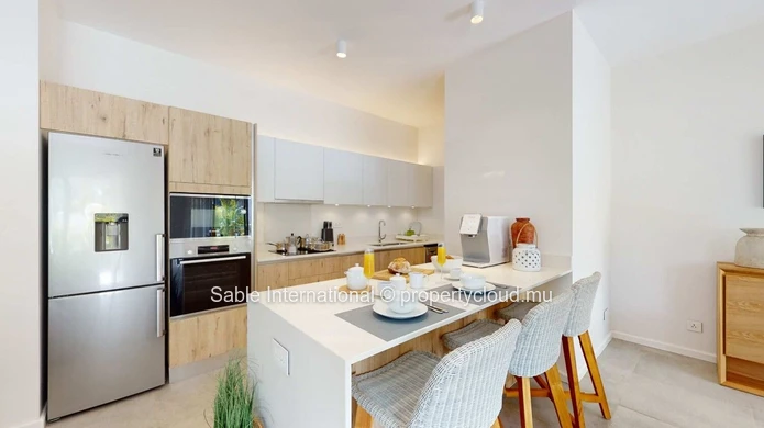 Luxury RES Apartment with Communal Pool in Prime Grand Baie Location! 2 Beds, Balcony, Indoor Spa, Close to Amenities.