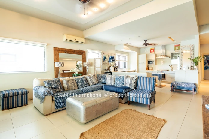 Luxurious Beachfront RES Apartment in Rivière Noire with stunning views and modern amenities. 4 bedrooms, sea access,...