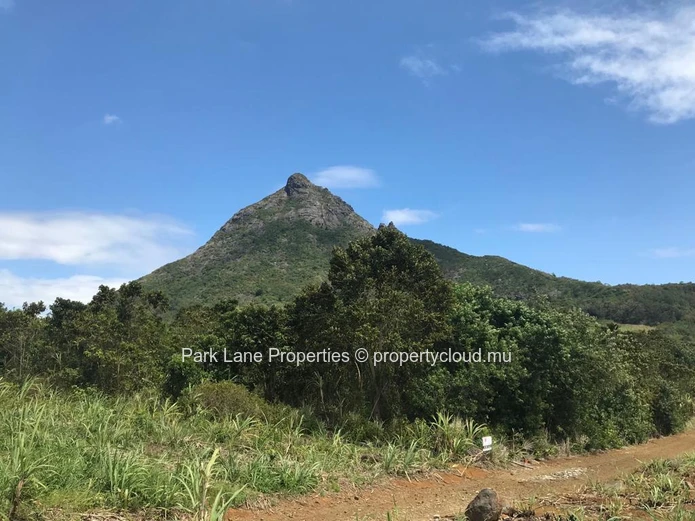 Vast plot of agricultural land with splendid views over mountain in St Pierre, Moka.