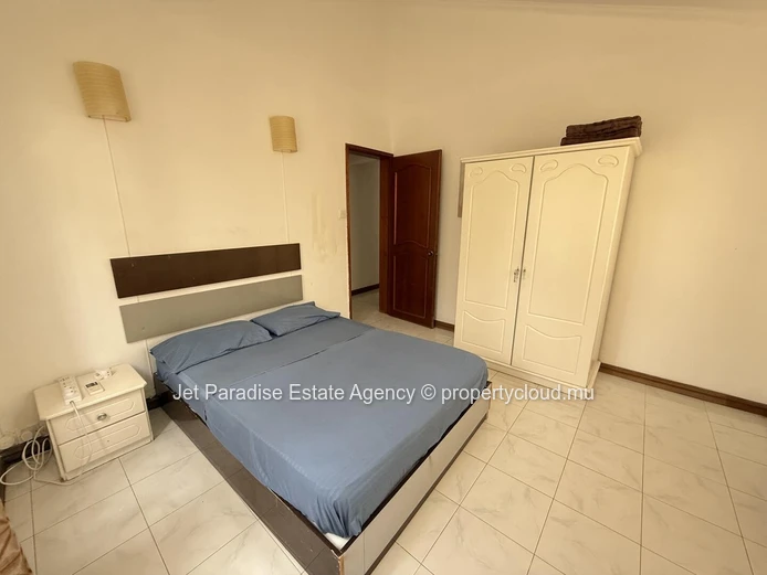 Luxurious 5-bedroom house with private pool in Flic en Flac area, sea access, fully furnished, secure. Price Rs.
