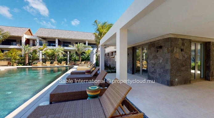 Luxury RES Apartment with Communal Pool in Prime Grand Baie Location! 2 Beds, Balcony, Indoor Spa, Close to Amenities.