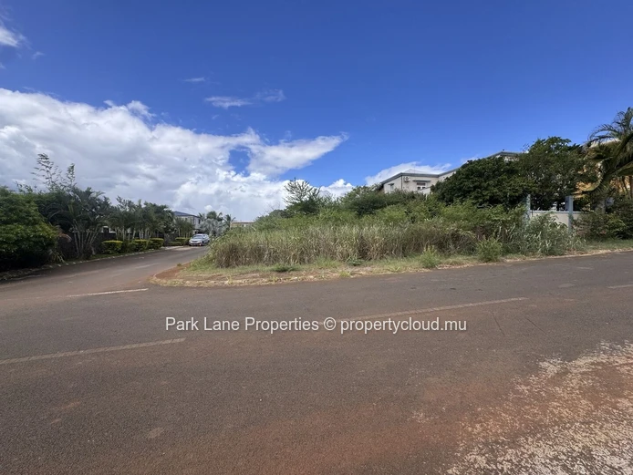 Land on corner in well established estate