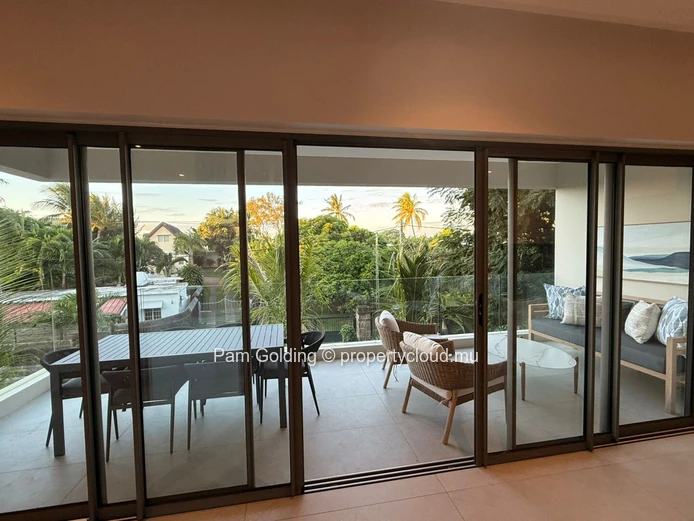 Appartement de 3 chambres récemment mis sur le marché à La Pointe Phase 2 | Confort moderne et art de vivre côtier