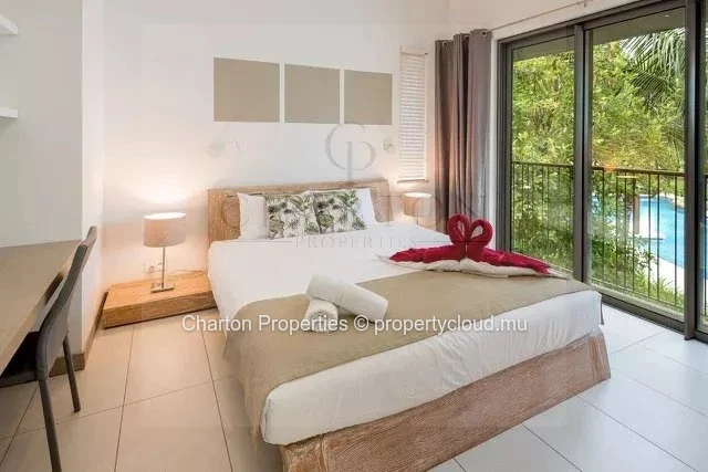 Appartement de 2 chambres en suite avec terrasse et vue dégagée sur le golf