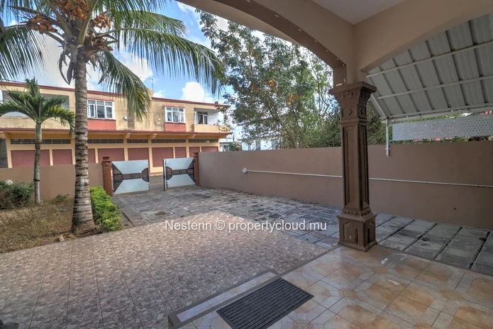 Spacious traditional triplex apartment in Grand Baie with 2 bedrooms, furnished, air conditioning, veranda, and close...