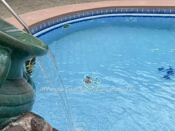 Luxurious 5-bedroom house with private pool in Flic en Flac area, sea access, fully furnished, secure. Price Rs.