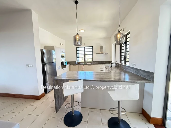 Beachfront Luxury Living with Panoramic Ocean Views
