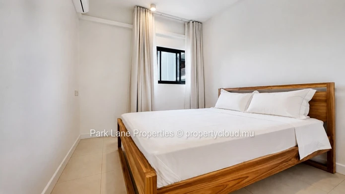 New 2-bedroom ground-floor apartment with communal pool in Beau Plan