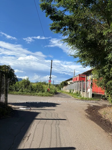 Prime 4,200m² Commercial Plot in Petit Camp — Mountain Views & Near Bus