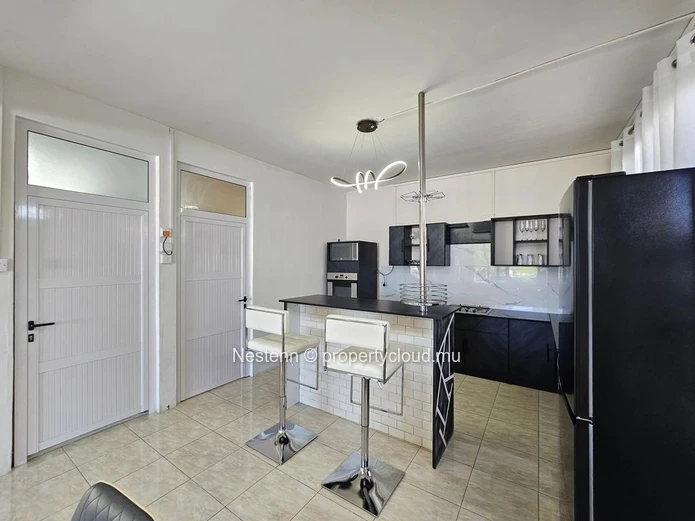 Vie côtière moderne – Spacieux appartement de 3 chambres au cœur de Blue Bay