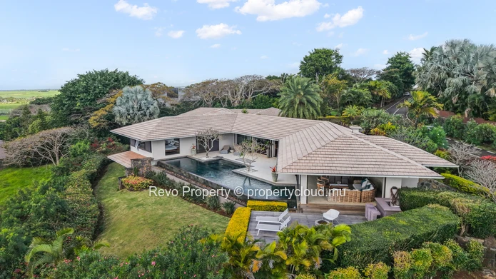 A 6-Bedroom Hillside Sanctuary with Panoramic Ocean Views.