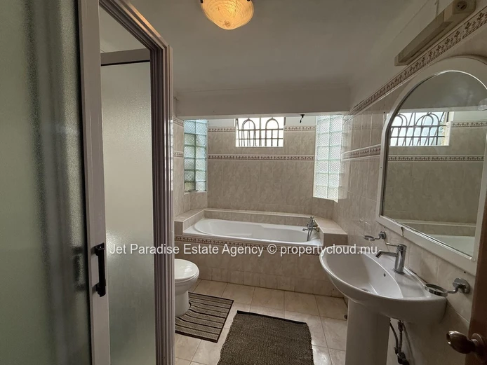 Luxurious 5-bedroom house with private pool in Flic en Flac area, sea access, fully furnished, secure. Price Rs.