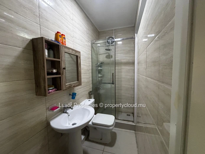 2-Bedroom Apartment in Flic en Flac | Rooftop Sea Views | Pool & Party Area 