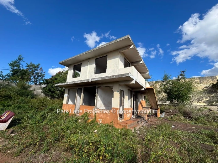 Expansive 8,847 m² Secured Plot with Building and Asphalted Area