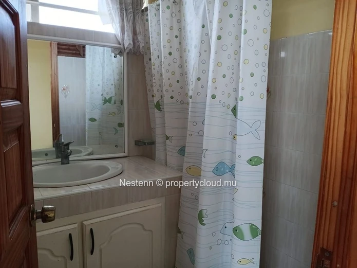 Appartement dans maison traditionnelle mauricienne dans un quartier résidentiel