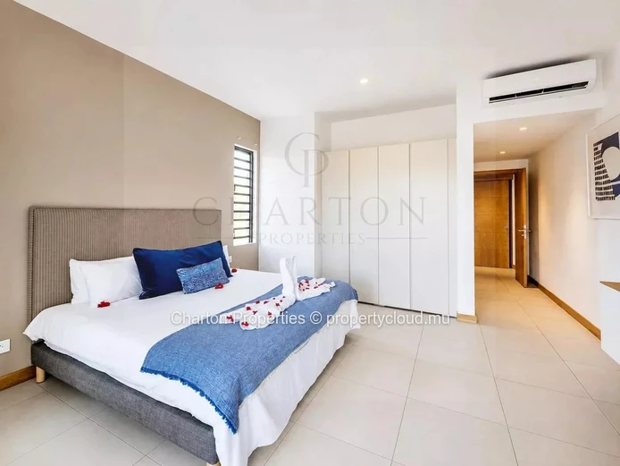 Elegant 3-bedroom apartment with en-suite bathrooms, a terrace, and exclusive amenities in Grand Gaube