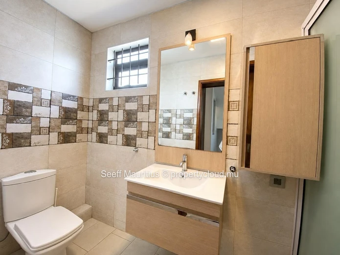 This splendid duplex features three bedrooms and three bathrooms