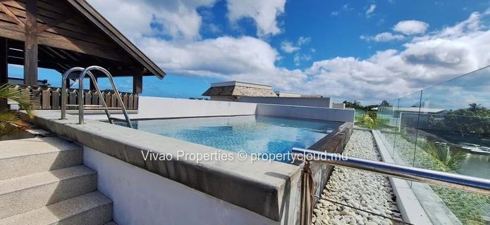 Villa IRS à vendre à Rivière Noire, 5 chambres, piscine privée, vue mer et montagne, proche commodités, amarrage pour...