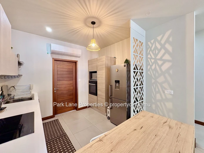 Appartement de 3 chambres avec accès mer à Blue Bay