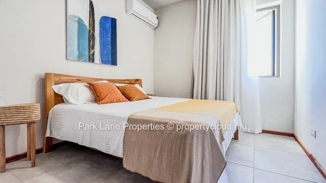 Appartement élégant dans une résidence neuve avec piscine et vue sur les montagnes à Flic en Flac