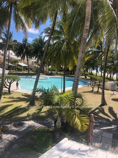 Beachfront 4-Bed Duplex in Belle Mare with Pool
