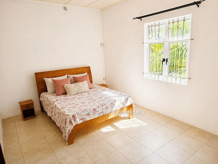 Appartement spacieux de 2 chambres à Blue Bay, à distance de marche de la plage