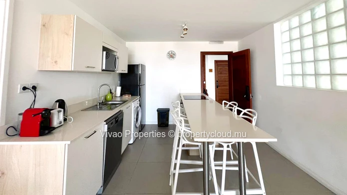Building for sale in Trou aux Biches, 780m² living space, 671m² of land, shared pool, close to the beach and shops, 8...