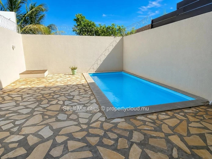 This splendid duplex features three bedrooms and three bathrooms