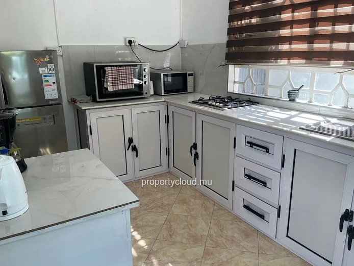 For sale in Mont Choisy, 300m from the beach. 4-bedroom villa + rooftop terrace. Reserved for local market - rare inv...